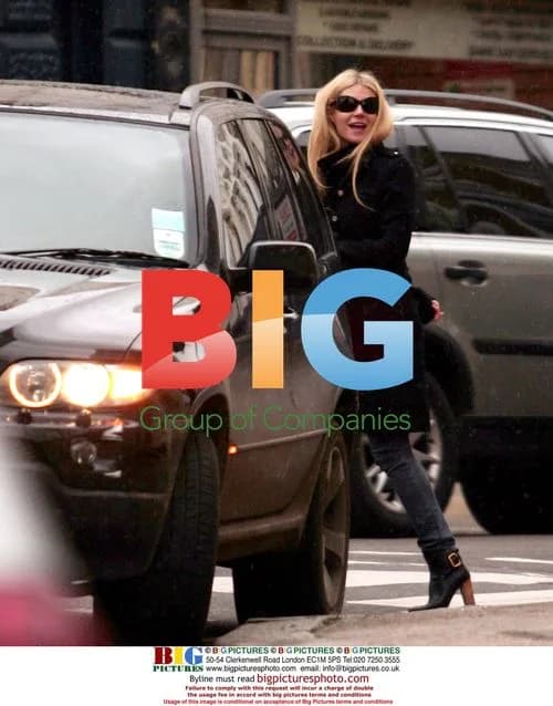 Gwyneth Paltrow Dashes Into BMW X5 in London