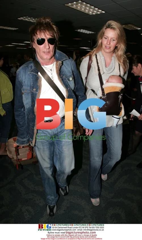 Rod Stewart and Penny Lancaster with baby at Miami airport