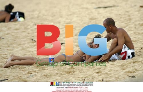 Supermodel Gisele and Pro Surfer Kelly Enjoy Beach Day