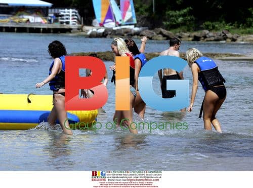 Glamour Girls Pass By Warship on Banana Boat