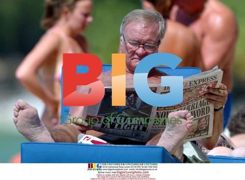 Ron Atkinson Relaxing on Barbados Beach