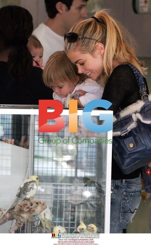 Denise Richards and son in pet store