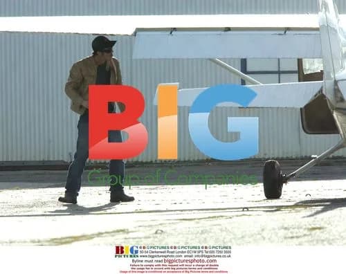 Brad Pitt Inspects Plane