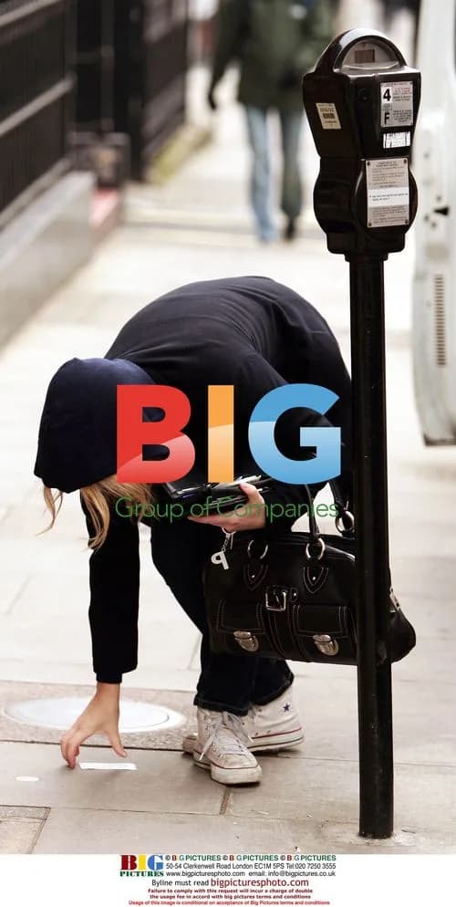 Patsy Kensit seen feeding parking meter in London