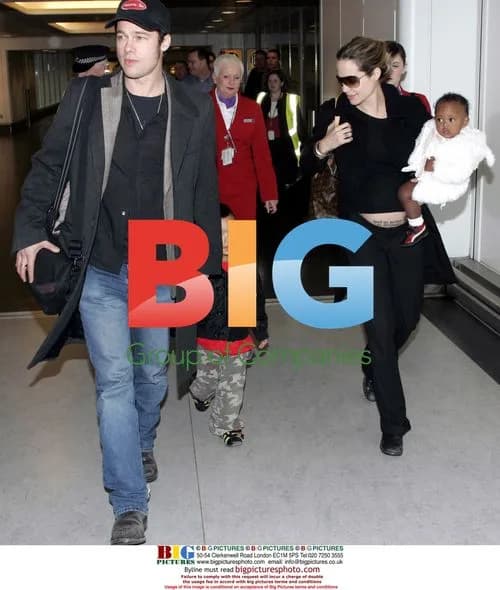 Angelina Jolie and Brad Pitt arrive at Heathrow