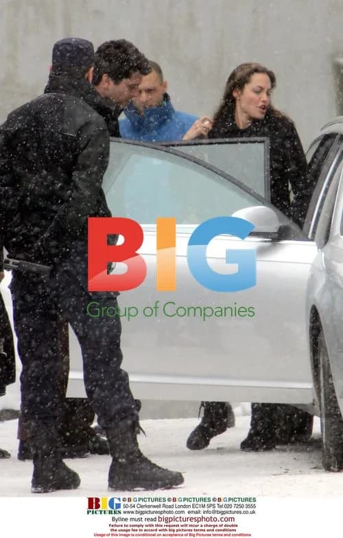 Angelina Jolie and Brad Pitt leave Davos