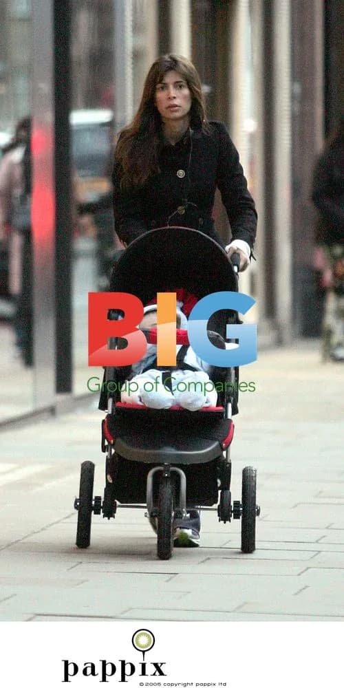 Lisa Barbuscia enjoys stroll with baby in London