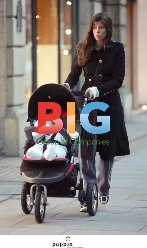 Lisa Barbuscia strolling with baby in London