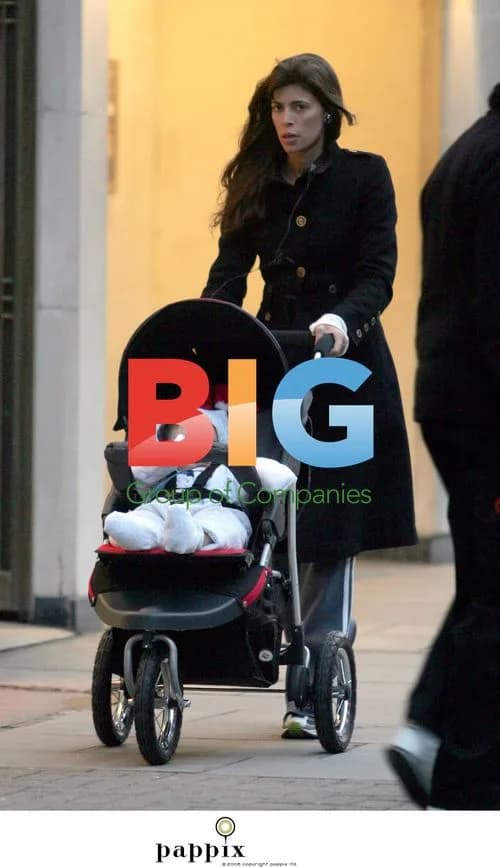 Lisa Barbuscia enjoys stroll with baby in London