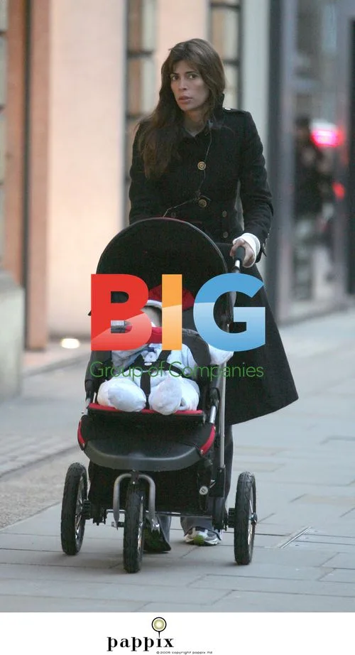 Lisa Barbuscia takes stroll with baby in London