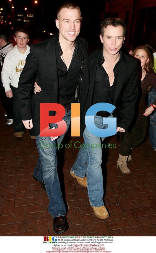 Singer Stephen Gately and boyfriend arrive at aftershow party