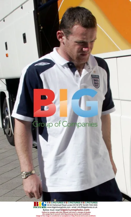 Gloomy Wayne Rooney arrives at hotel in Baden Baden