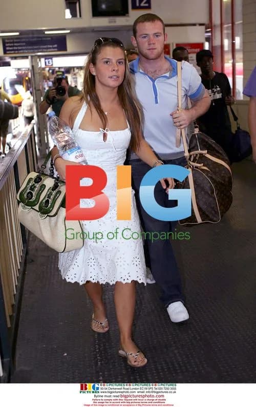 Wayne Rooney and Coleen Arrive in London