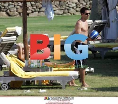 Jamie and Louise Redknapp at the pool in Italy