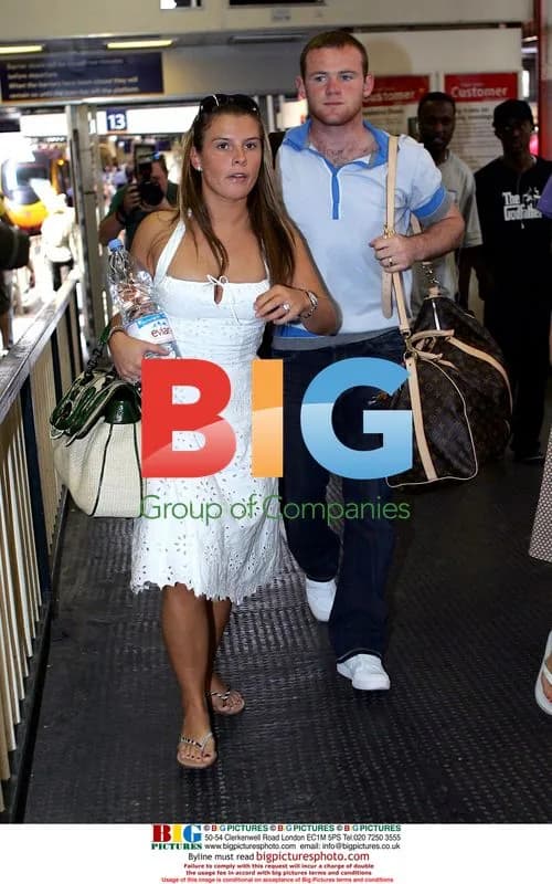 Wayne Rooney and Coleen Arrive in London