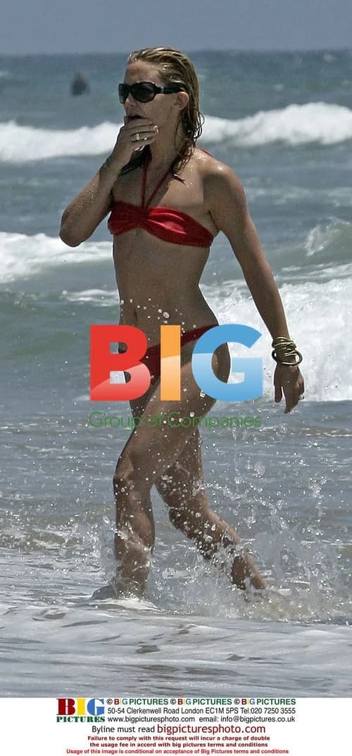 Kate Hudson Sunbathing in Malibu