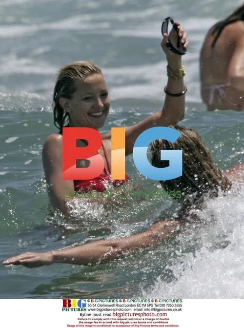 Kate Hudson Sunbathes in Malibu