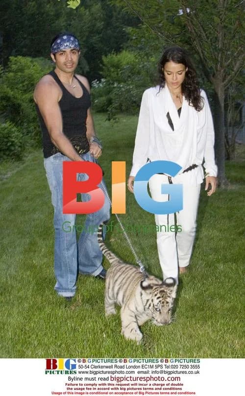 Michelle Rodriguez and Anand Jon with Tiger