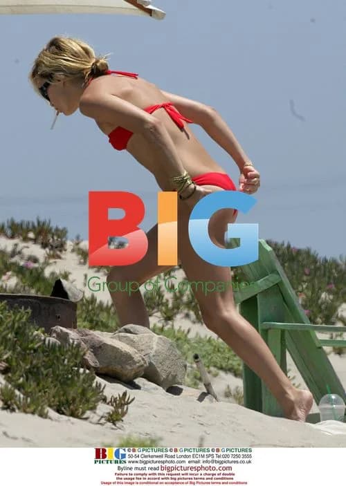 Kate Hudson Sunbathing in Malibu