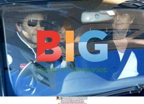 Russell Crowe leaves hospital with son