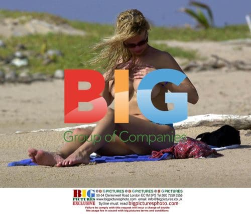 Alicia Douvall Relaxes in Barbados