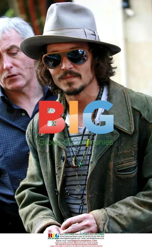 Johnny Depp leaves Plaza Athenee