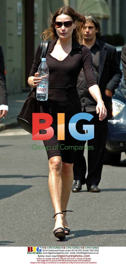 Carla Bruni at Funeral of Brother Virginio