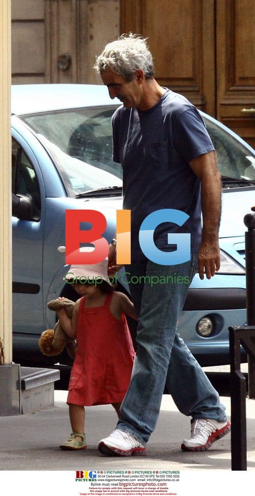 Raymond Domenech and family out in Paris
