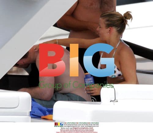 Wayne Rooney and Coleen McLoughlin on vacation