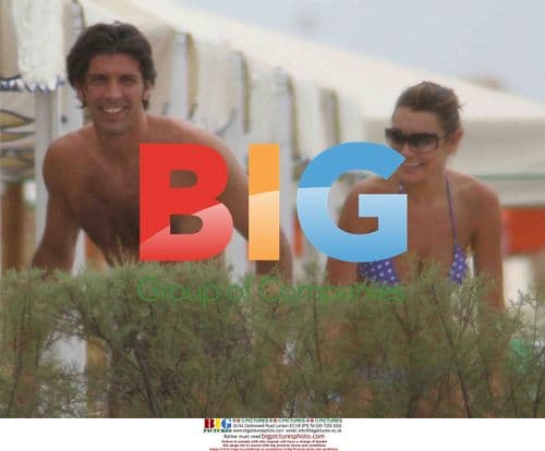 Model Alena Seredova and footballer Gigi Buffon on the beach