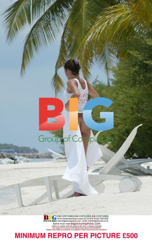 Model Sophie Anderton on Caribbean beach