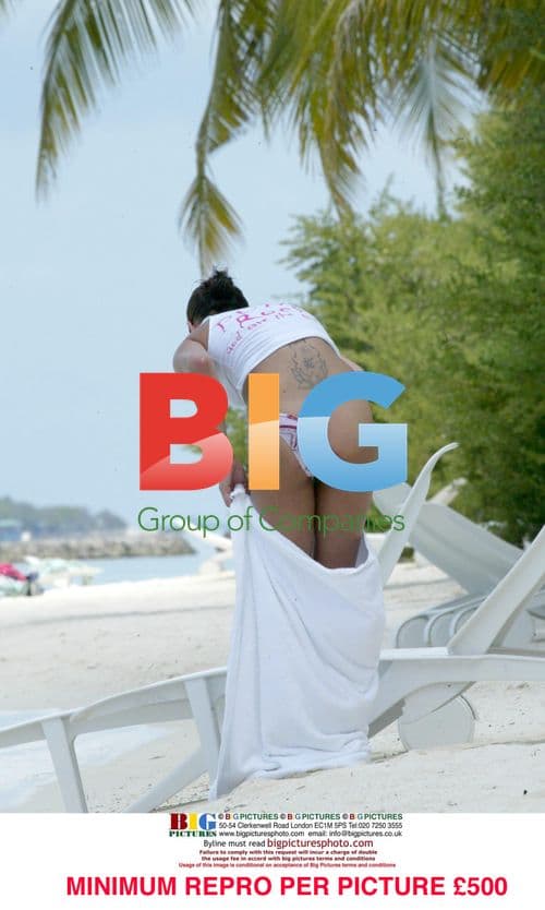 Model Sophie Anderton on the beach