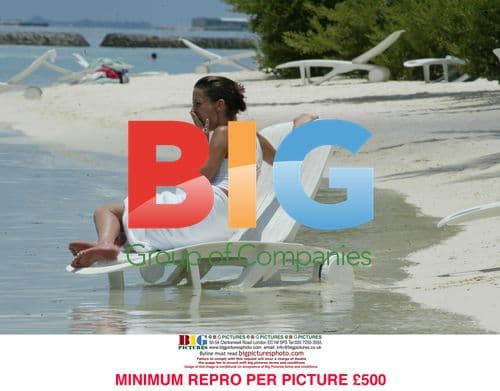 Model Sophie Anderton on Caribbean beach