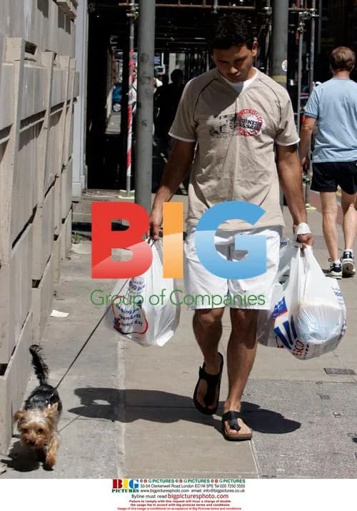 Tina O'Brien's boyfriend Ryan Thomas walks her dog