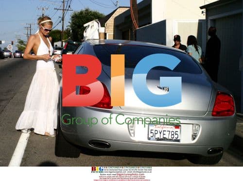 Paris Hilton in White Couture Dress with Silver Bentley