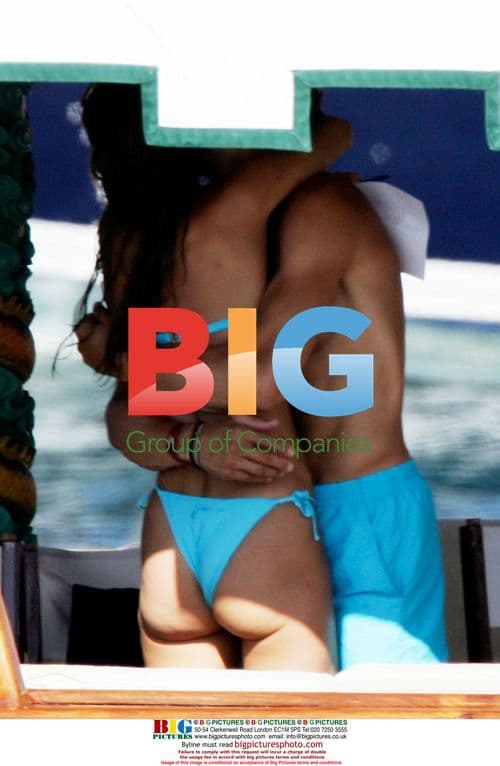 Austrian finance minister and partner enjoy beach in Italy