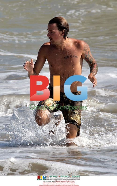 Sean Stewart swims in Malibu