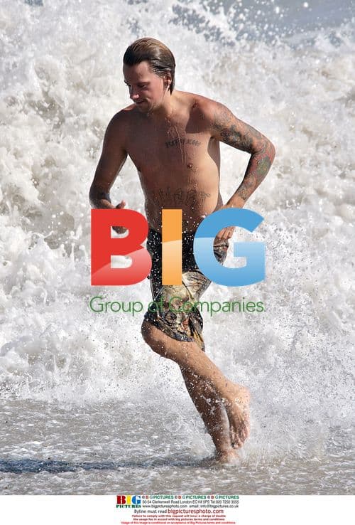 Sean Stewart takes dip in Malibu surf