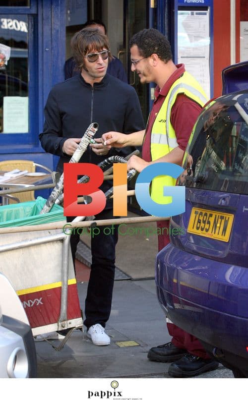 Oasis frontman Liam Gallagher messing with street cleaner