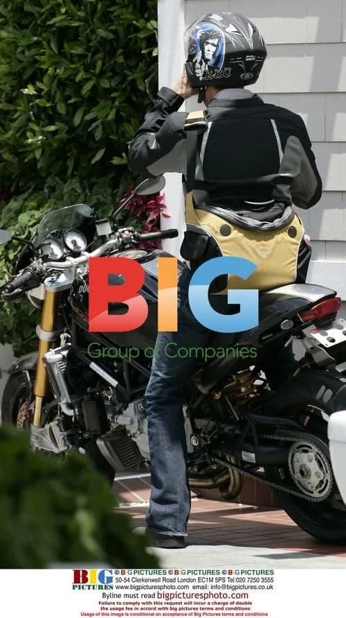 Brad Pitt Rides Motorcycle to Shutter Hotel