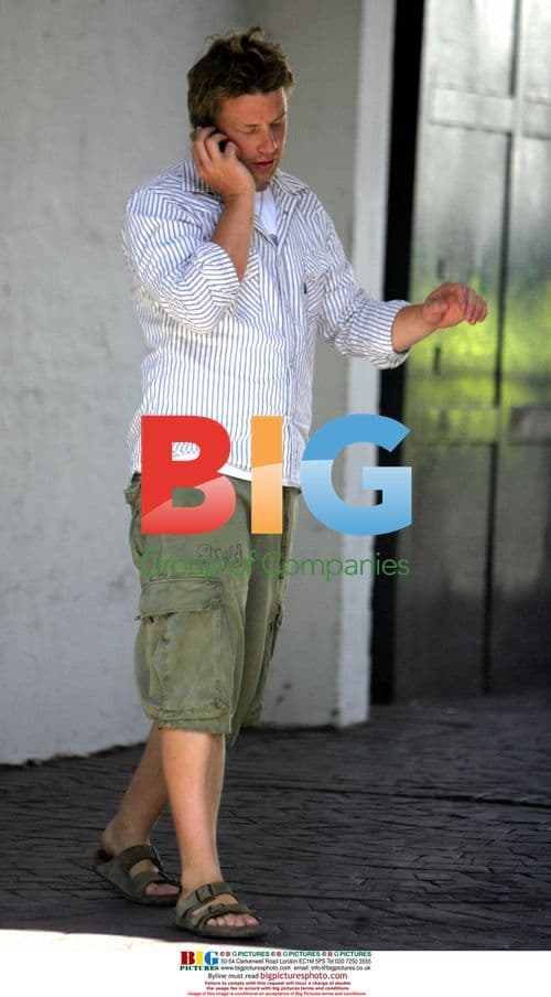 Jamie Oliver chatting on phone in London