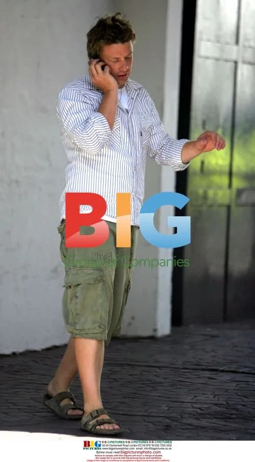 Jamie Oliver chatting on phone in London