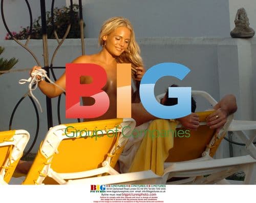 Glamour Girl Holly McGuire Strips in Spain