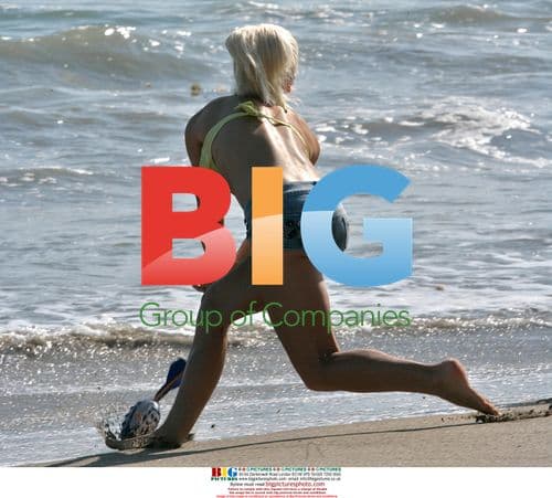 Kendra Wilkinson Plays Catch on Malibu Beach