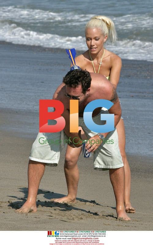 Kendra Wilkinson Plays Catch on Malibu Beach
