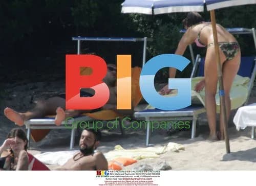 Michael Ballack relaxes on holiday with wife in Italy