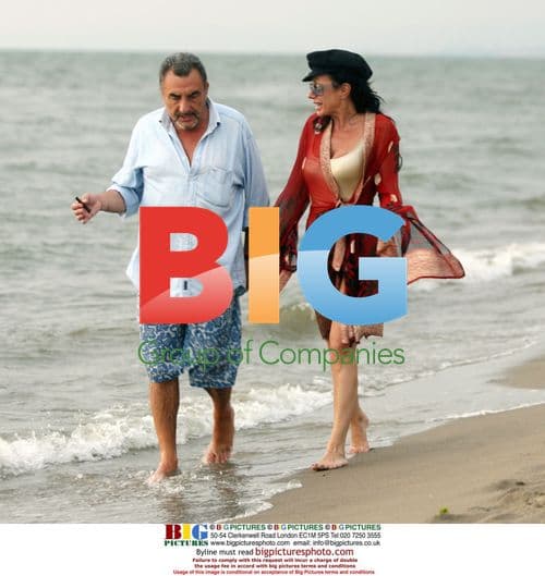 Nancy Dell'Olio and friend on beach in Fregene