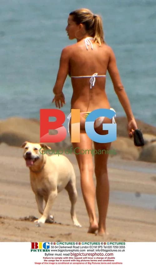 Gisele Bundchen Relaxes with Dogs at Malibu Home