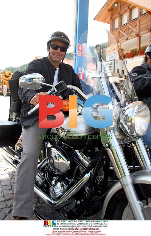 George Clooney rides Harley in Dolomites