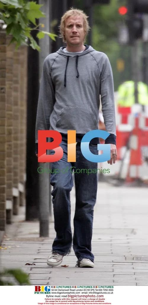 Rhys Ifans enjoys stern walk in London